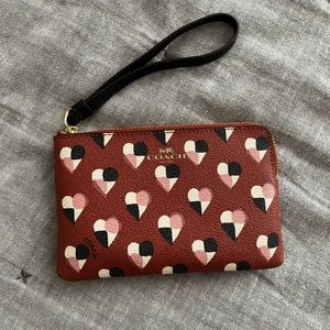 6”x4” maroon patterned Coach wristlet pouch